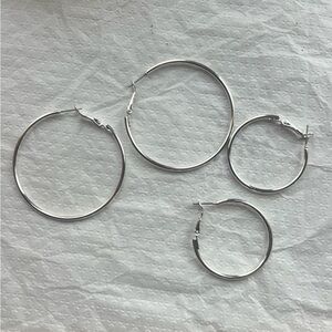 Two Pairs of silver toned Hoop earrings